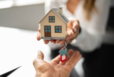 Woman Real Estate Agent Or Broker. House Sale